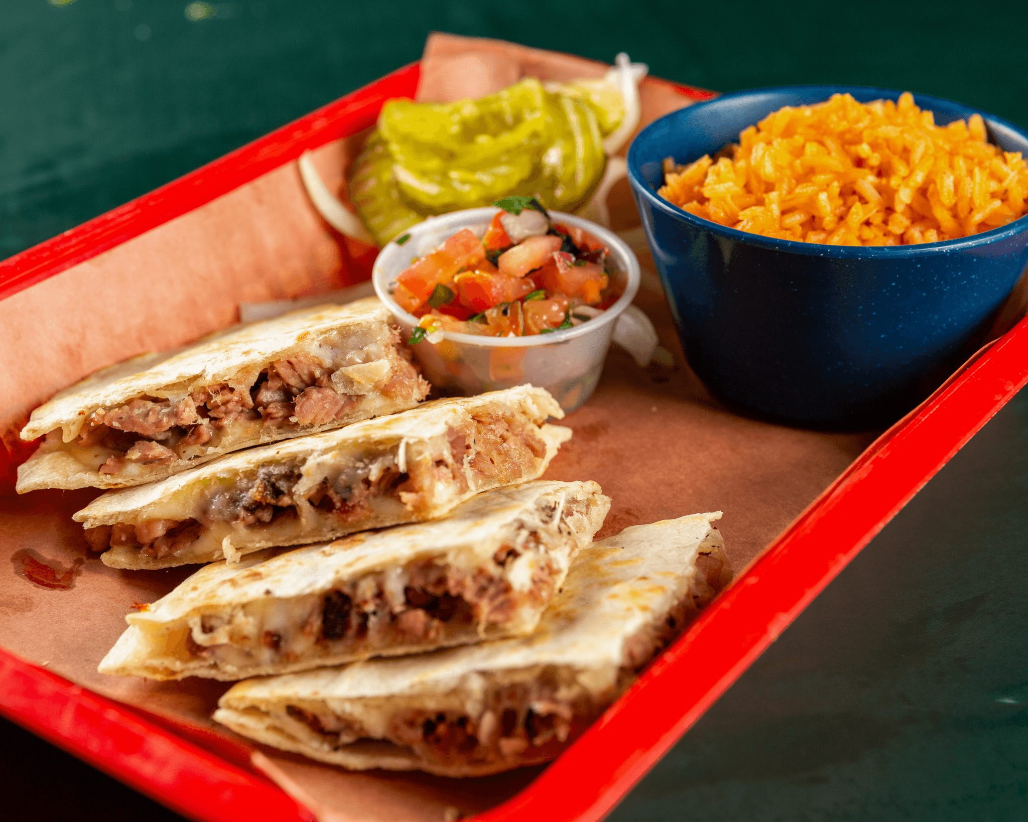 Brisket Quesadilla with 1 Side.